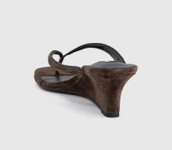 Edgy Toe Post Wedge Heels